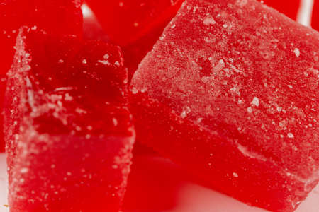 Red marmalade on white background. Fruit sweetsの写真素材