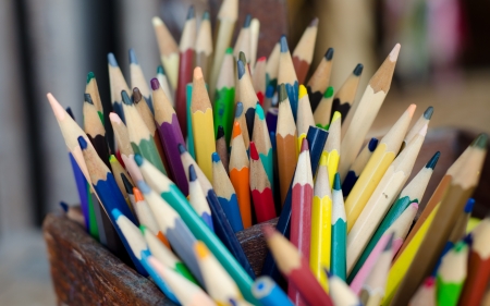colour pencils in basket の写真素材