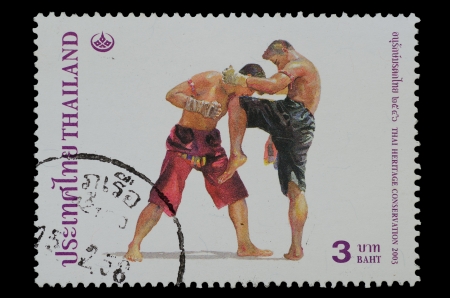 THAILAND - CIRCA 2003  A stamp printed in Thailand ,shows Thai boxing style from the series THAI HERITAGE CONSERVATION, circa 2003  の写真素材