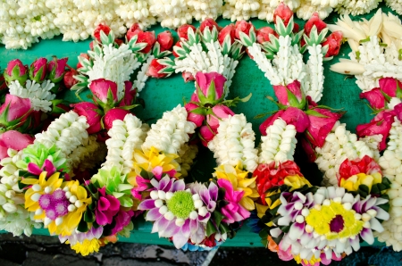 Thai style garland at flower market in Thailandの写真素材