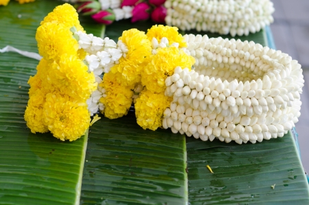 Thai style garland at flower market in Thailandの写真素材