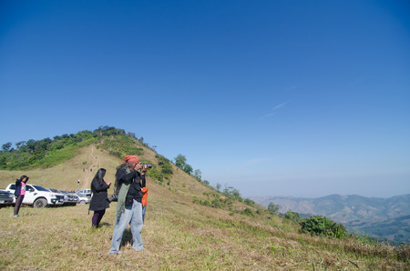 LOEI THAILAND - JANUARY 17 : Tourists happy with your visit  phu lomlo moutain at Loei, Thailand on January 17, 2015のeditorial素材