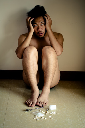 Young man mania from drug addictionの写真素材
