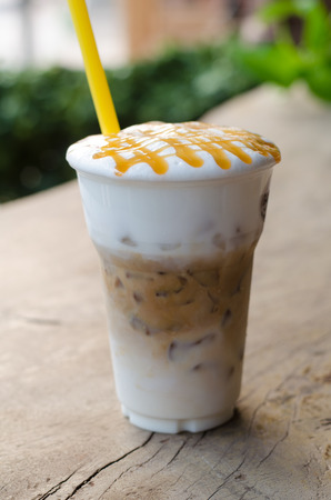 ice coffee on wooden tableの写真素材