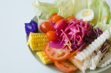 Fresh vegetable salad with beetroot sauceの写真素材