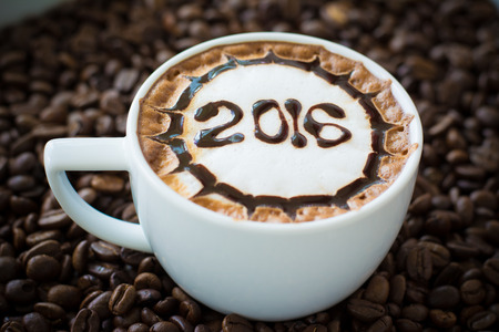 hot coffee with foam milk art 2016 patternの写真素材
