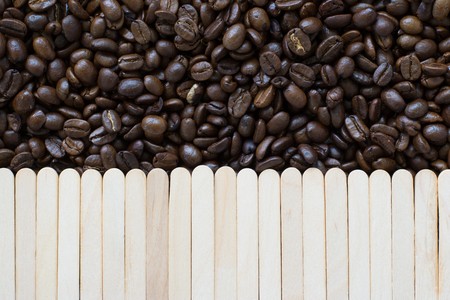 coffee bean and wooden stick backgroundの写真素材