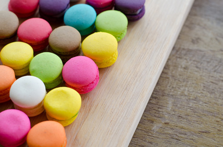 Colourful tasty macaroons in a rowの写真素材
