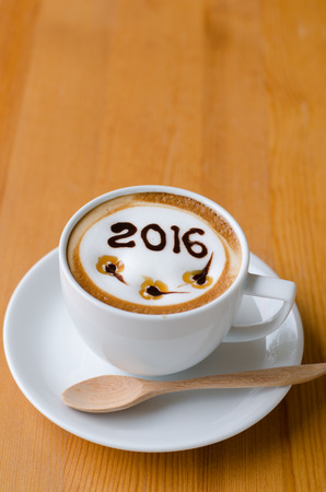 hot coffee with foam milk art 2016 patternの写真素材