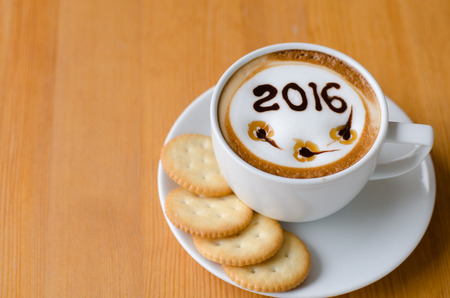 hot coffee with foam milk art 2016 pattern