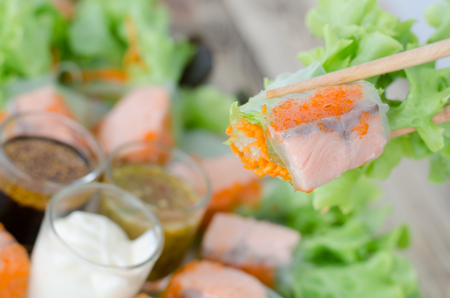 Salmon and crab eggs Salad Rollsの写真素材