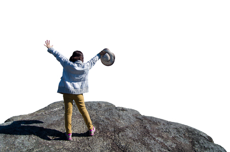 Young traveler standing on big cliff isolated on white backgroundの写真素材