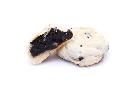 Chinese pastry,  Black bean cake isolated on white backgroundの写真素材