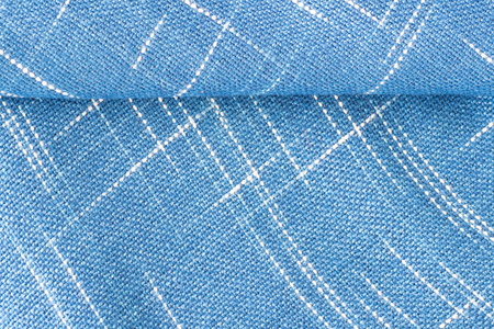 Handmade cotton woven fabric as a background and texture