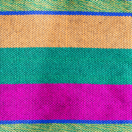 Handmade cotton woven fabric as a background and textureの写真素材