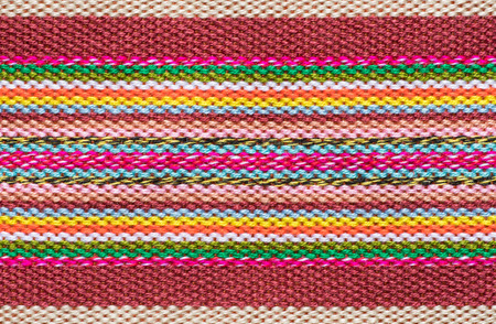 Handmade cotton woven fabric as a background and texture