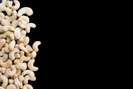 Cashew nuts isolated on black backgroundの写真素材