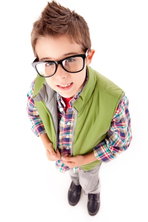Smiling little boy posing over white backgroundの写真素材
