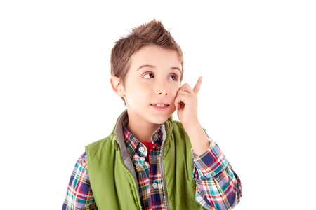 Smiling little boy posing over white backgroundの写真素材