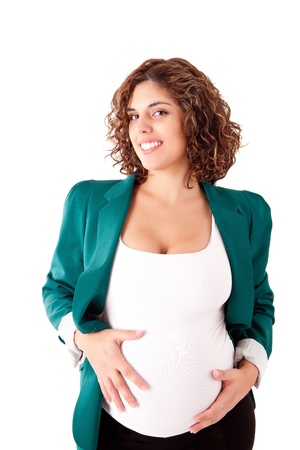 Beautiful pregnant woman showing her good shape over white backgroundの写真素材