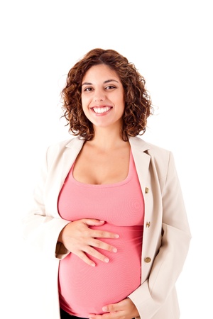 Beautiful pregnant woman showing her good shape over white backgroundの写真素材