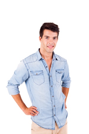 Portrait of handsome young man in casual clothes standing over white backgroundの写真素材