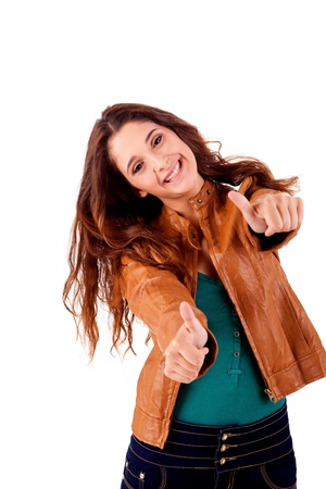 Beautiful young woman doing thumbs up on white backgroundの写真素材