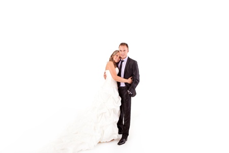 Loving couple embracing on white backgroundの写真素材