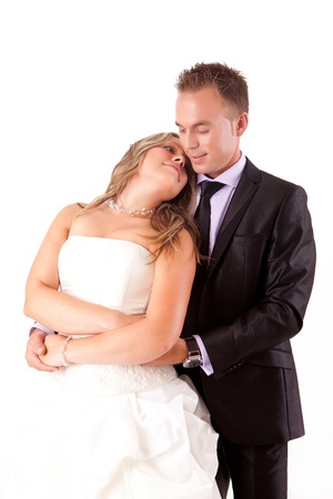 Loving couple embracing on white backgroundの写真素材