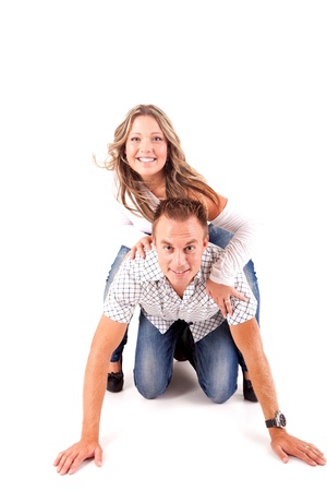 Loving couple embracing on white backgroundの写真素材