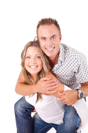 Loving couple embracing on white backgroundの写真素材