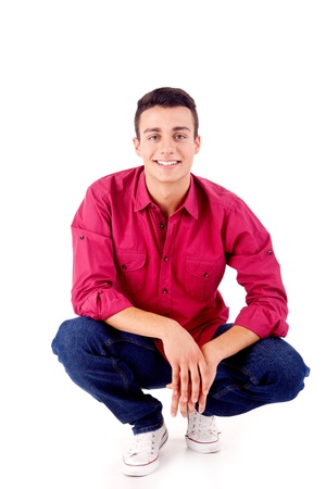 Portrait of handsome young man in casual clothes standing over white backgroundの写真素材