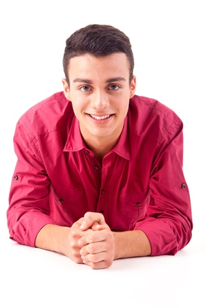Portrait of handsome young man in casual clothes standing over white backgroundの写真素材