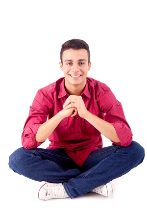 Portrait of handsome young man in casual clothes standing over white backgroundの写真素材
