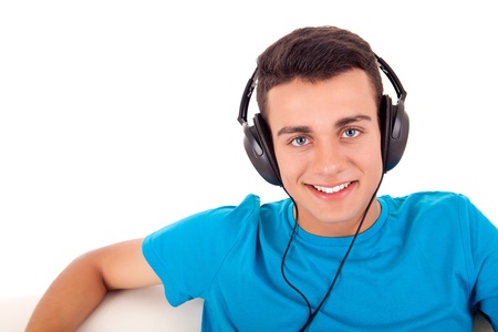 Beautiful young man listening to music on his headphonesの写真素材