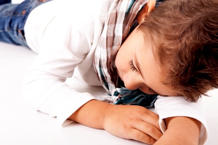 Adorable kid over white backgroundの写真素材