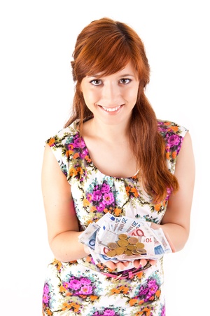 Happy woman showing Euros currency notes on white backgroundの写真素材