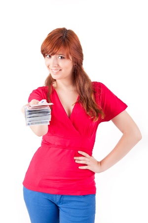 Happy woman showing Euros currency notes on white backgroundの写真素材