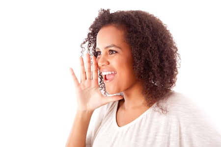 Beautiful african woman calling someoneの写真素材