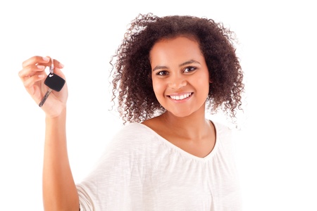 Beautiful african woman holding a car keyの写真素材