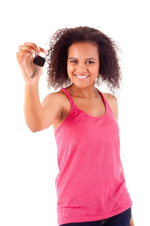 Beautiful african woman holding a car keyの写真素材