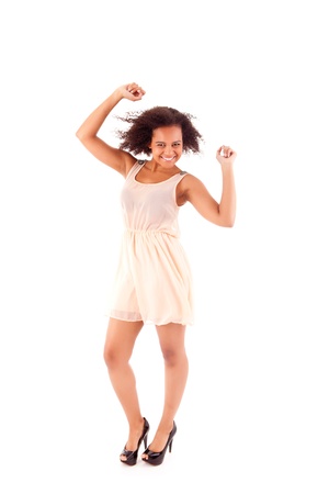 Beautiful african woman celebrating の写真素材