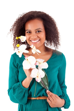 Beautiful african woman with flowersの写真素材