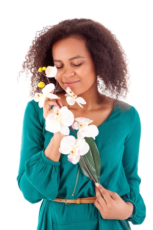 Beautiful african woman with flowersの写真素材