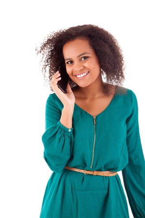 Beautiful african woman on the phoneの写真素材