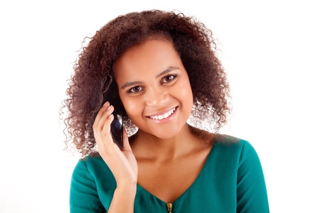 Beautiful african woman on the phoneの写真素材
