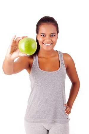 Beautiful african woman holding an apple - Healthy Lifeの写真素材