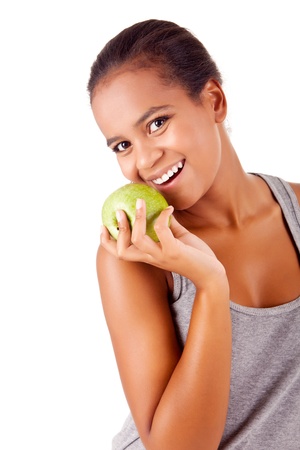 Beautiful african woman holding an apple - Healthy Lifeの写真素材
