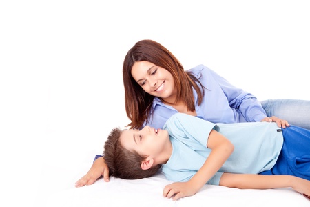 Happy mother with her child over white backgroundの写真素材