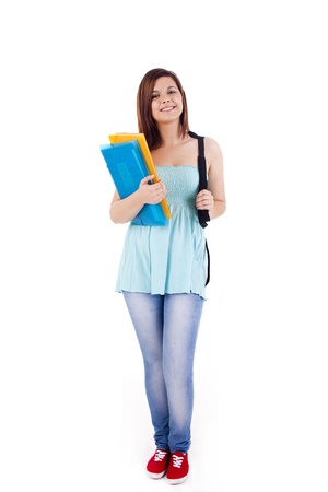 University girl holding books and smilingの写真素材